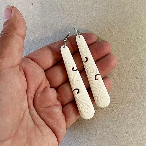 7cm Long Bone Earrings with Koru Carving - Image 2